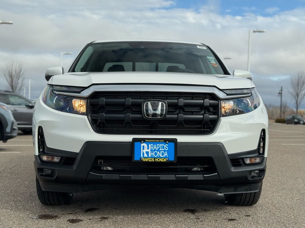 Certified 2026 Honda Ridgeline RTL with VIN 5FPYK3F53TB000945 for sale in Coon Rapids, Minnesota