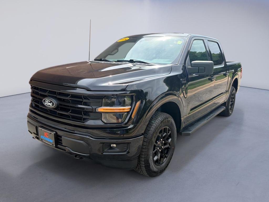 Used 2024 Agate Black Metallic Ford XLT image 1