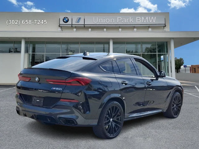 Used 2022 Black Sapphire Metallic BMW M50i image 4
