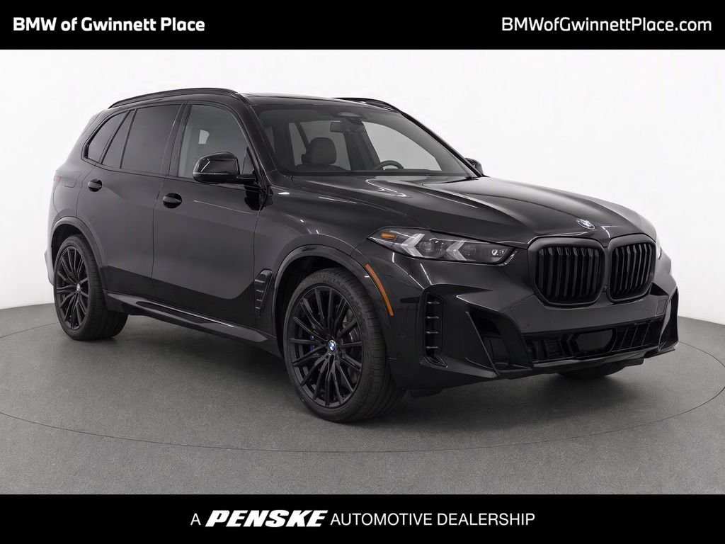 Certified Used 2024 Black Sapphire Metallic BMW sDrive40i image 1