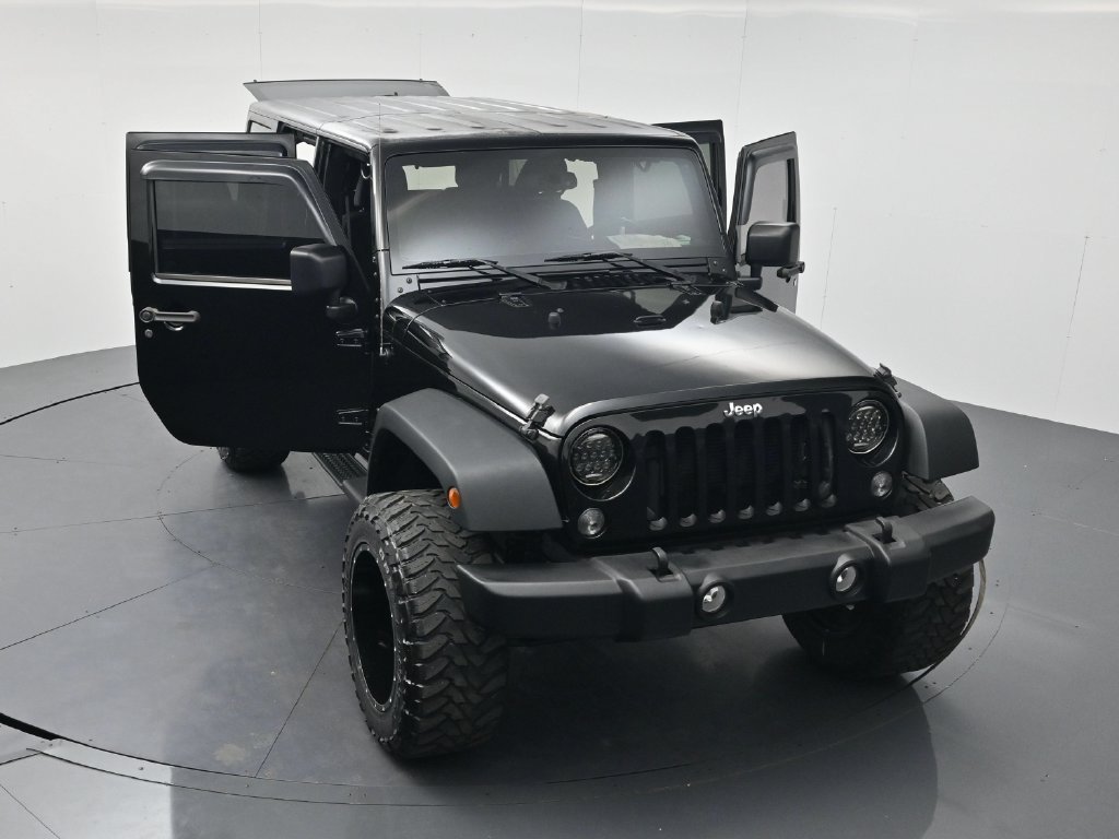 Used 2014 Black Clearcoat Jeep Unlimited Sport image 53