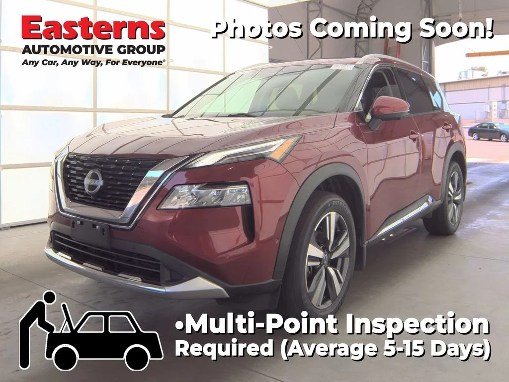 Used 2023 Red Nissan Platinum image 1