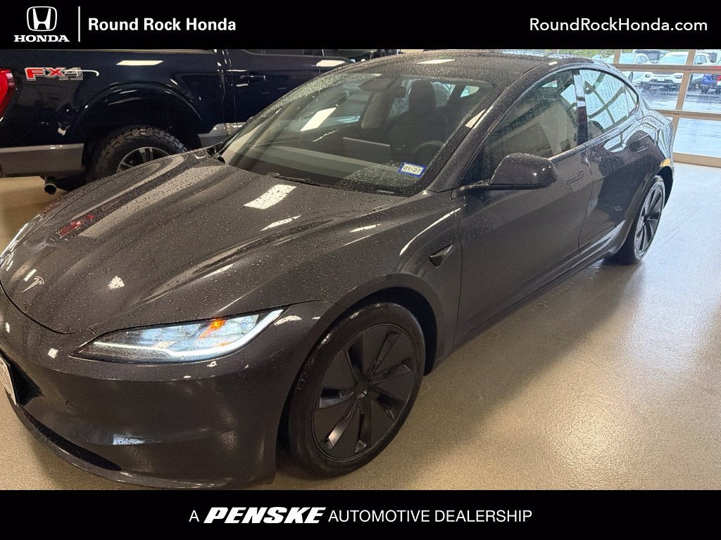 Used 2024 Stealth Gray Tesla Long Range image 1