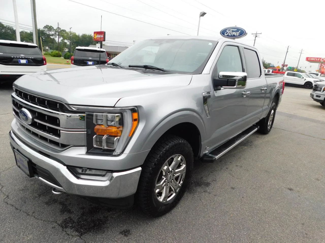 Used 2023 Iconic Silver Metallic Ford LARIAT 4WD SUPERCREW 6.5 ft image 4