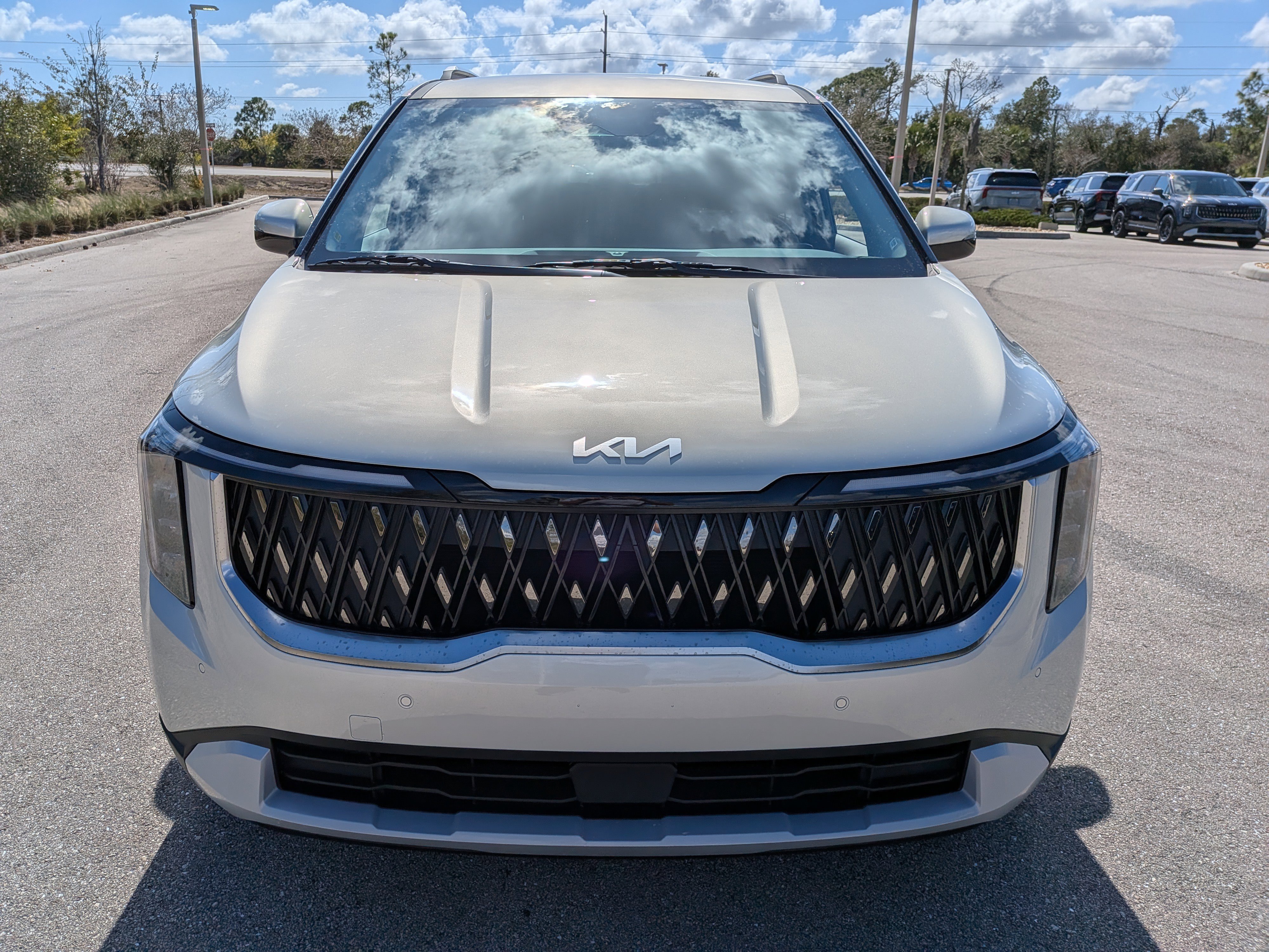 New 2026 Ivory Silver Kia EX image 3