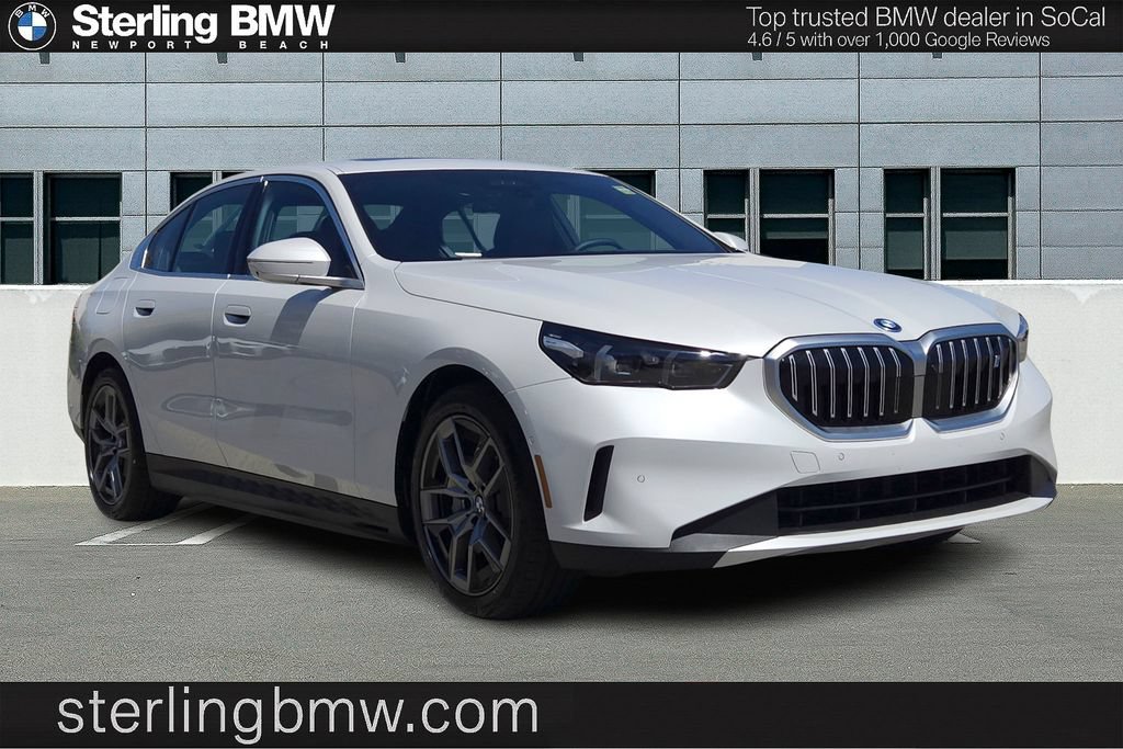 Used 2026 Mineral White Metallic BMW eDrive40 image 1