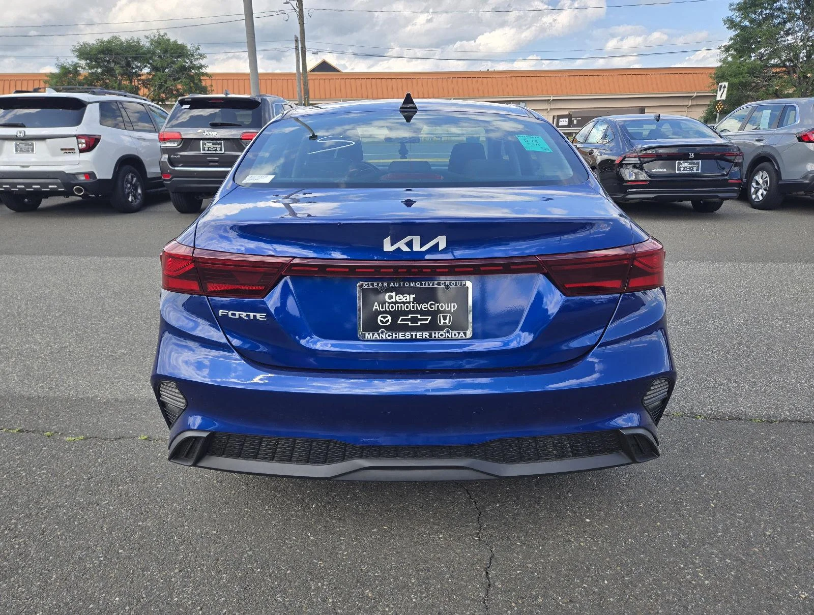Used 2024 Deep Sea Blue Kia LXS image 4