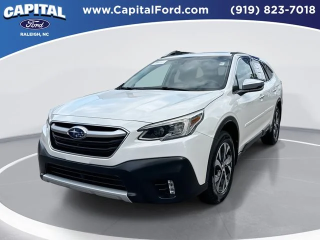 Used 2021 White Subaru Touring XT image 1
