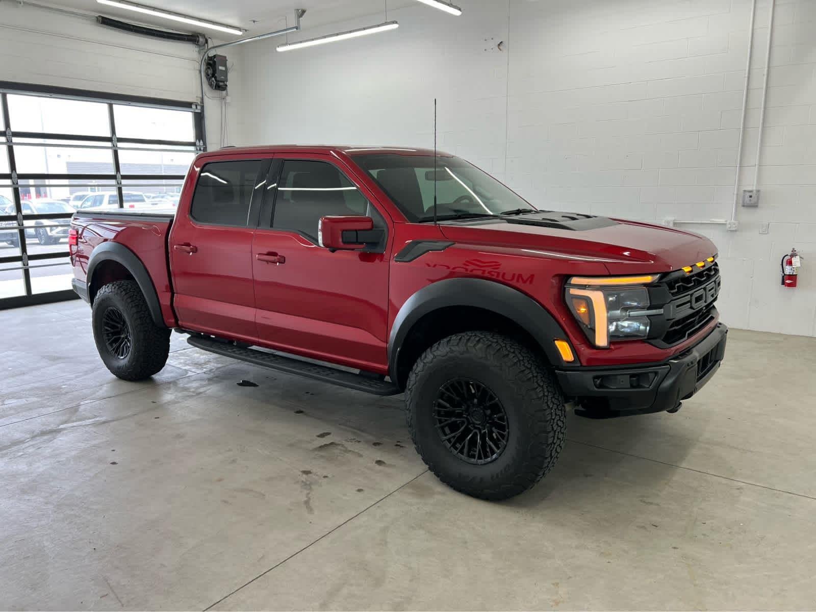 Used 2025 Rapid Red Metallic Tinted Clearcoat Ford Raptor image 5