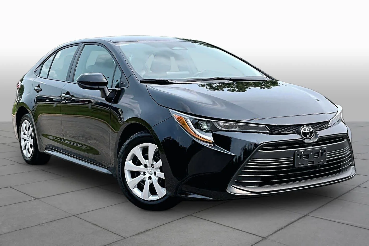 Used 2024 Midnight Black Metallic Toyota LE image 3