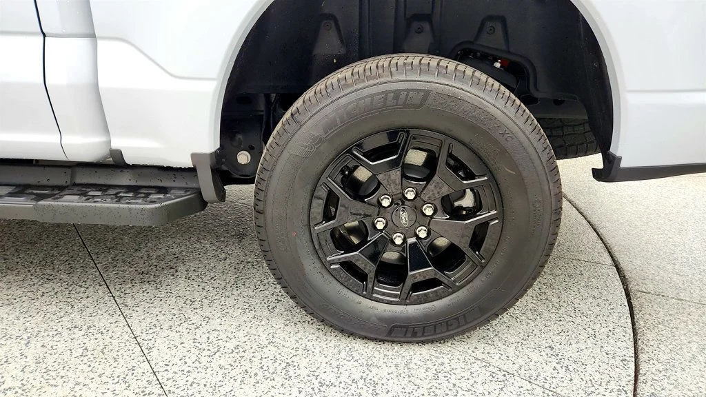 Used 2025 Space White Metallic Ford XLT 4WD SuperCrew 5.5