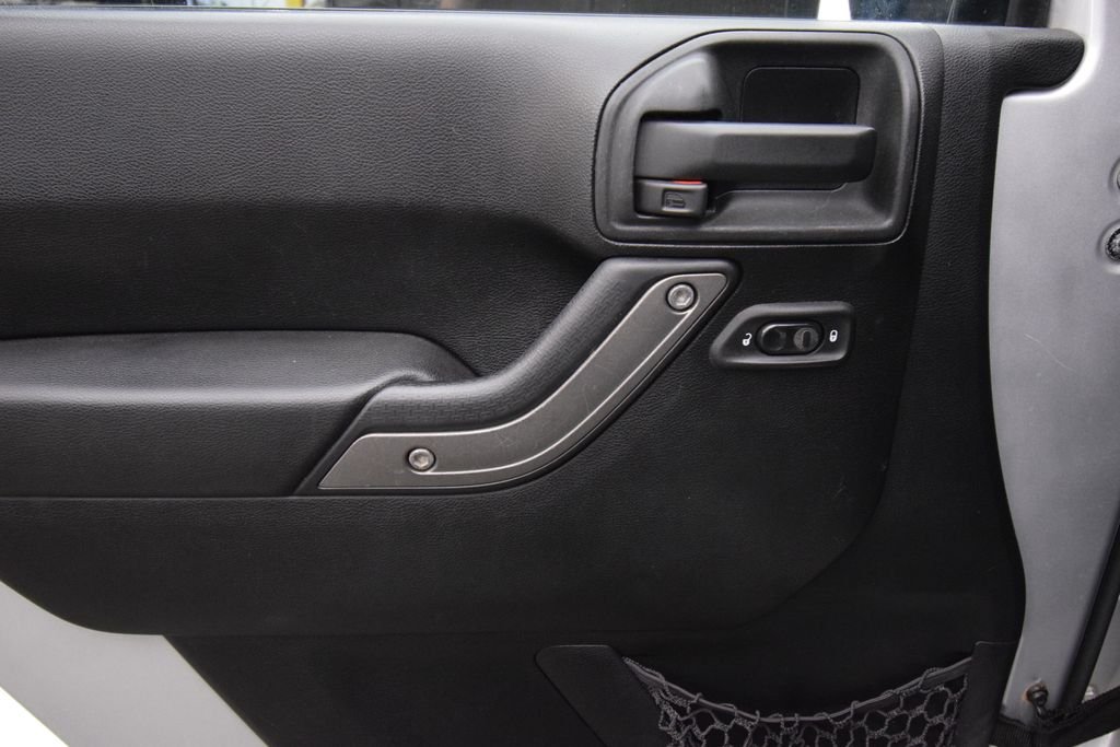 Used 2012 Bright Silver Metallic Clearcoat Jeep Sport image 18