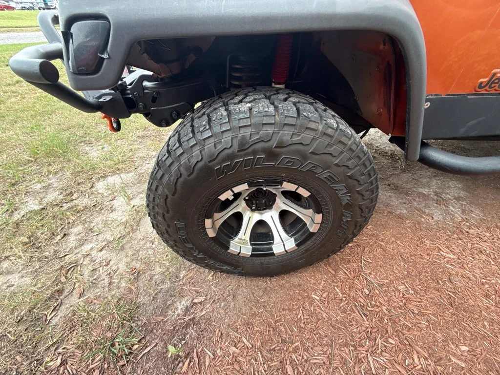 Used 2000 Orange Jeep Sport image 10