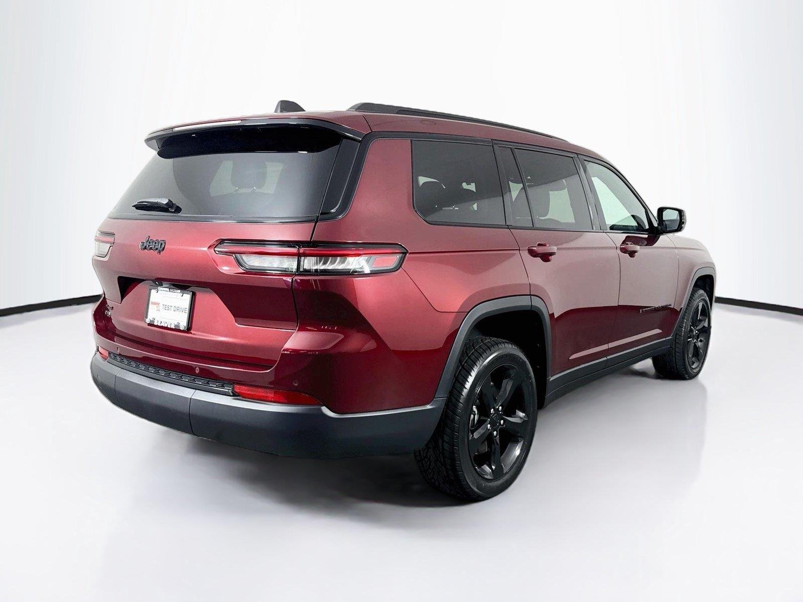 Used 2024 Velvet Red Pearlcoat Jeep Altitude X image 2