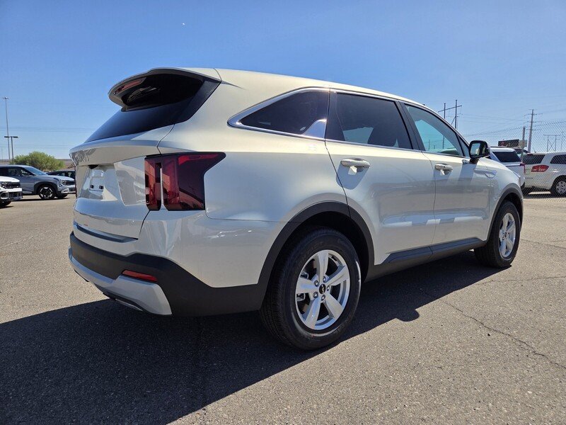 New 2026 Ivory Silver Kia LX image 3
