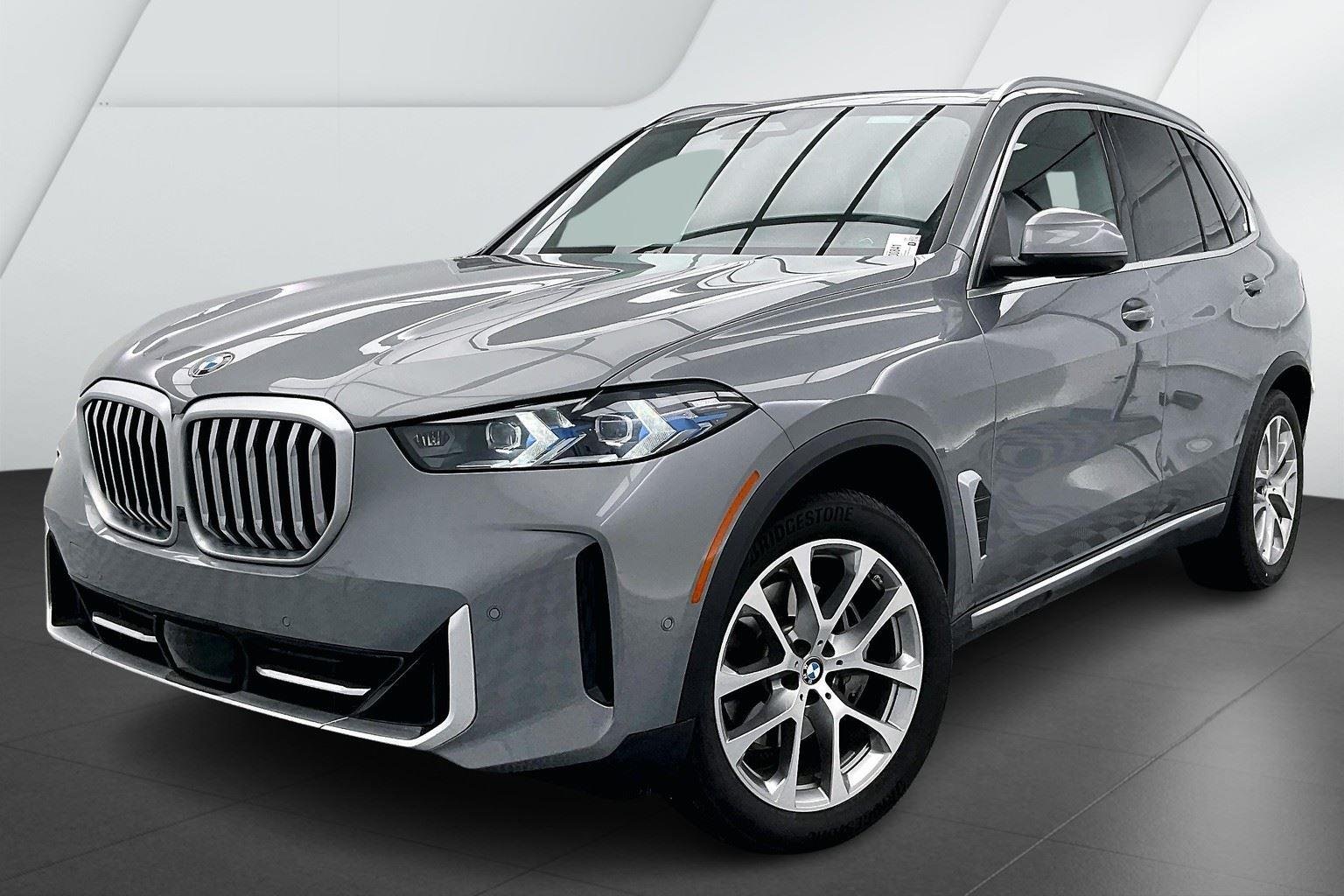 Certified Used 2024 Skyscraper Grey Metallic BMW xDrive40i image 1