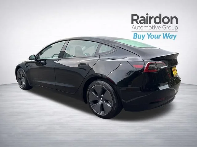 Used 2023 Solid Black Tesla Base image 5