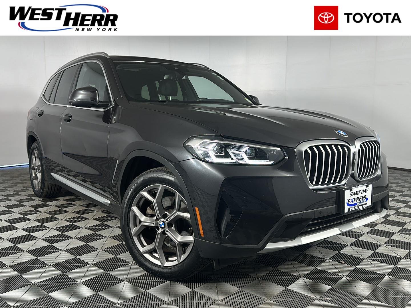 Used 2023 Dark Graphite Metallic BMW xDrive30i image 1