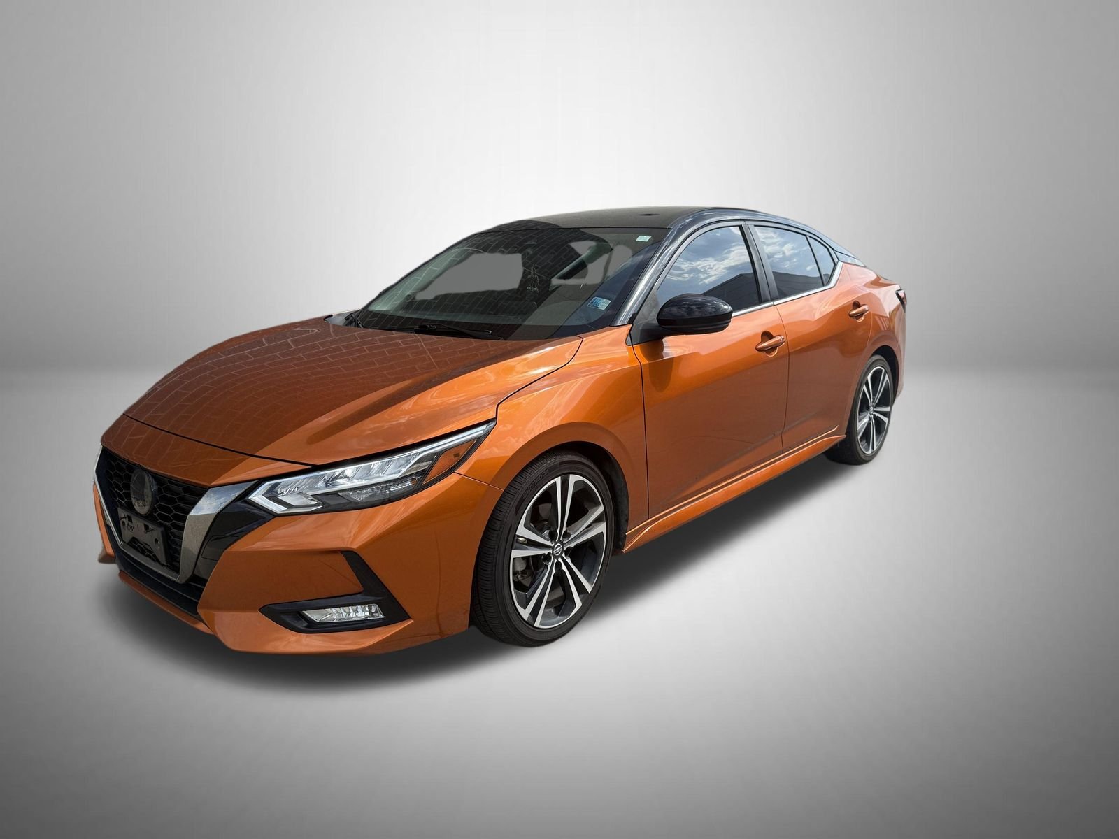 Used 2022 Orange Metallic Nissan SR image 1