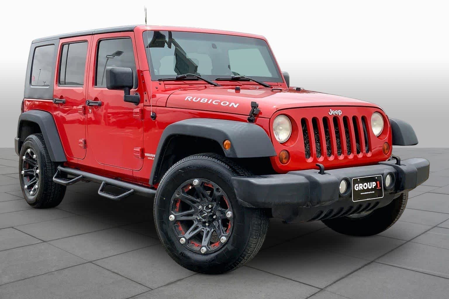 Used 2010 Flame Red Jeep Rubicon image 2