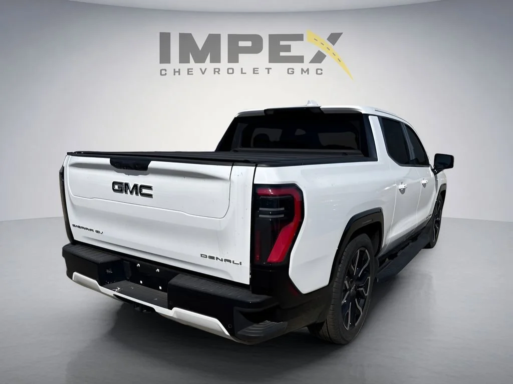 Used 2025 Summit White GMC Max Range Denali image 4