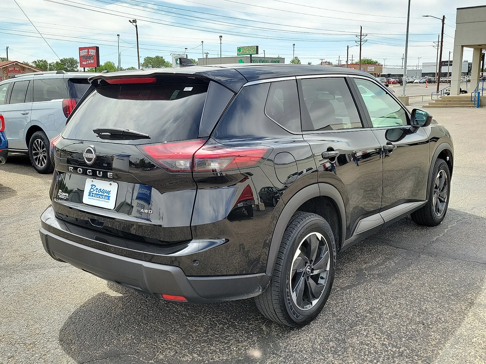 Certified Used 2025 Super Black Nissan SV Intelligent AWD image 10