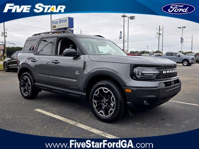 New 2026 Carbonized Gray Metallic Ford Outer Banks image 1