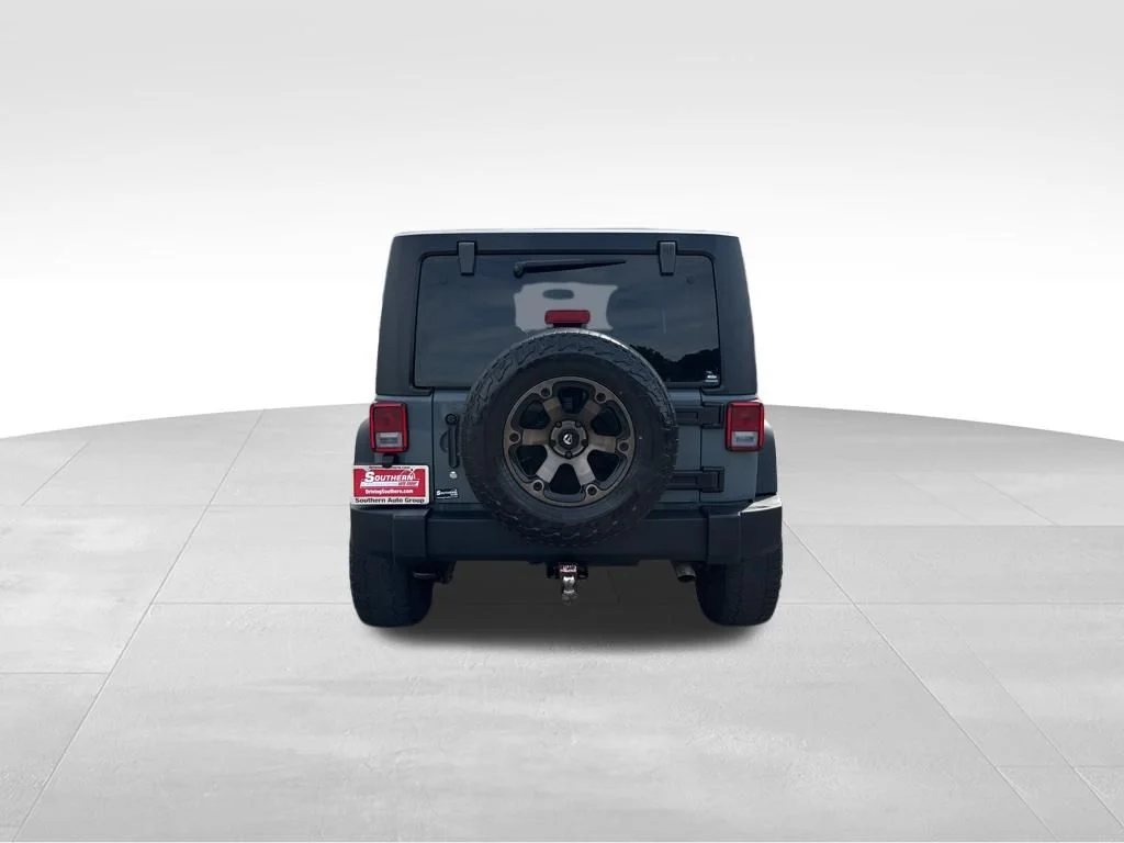 Used 2014 Gray Jeep Unlimited Sport image 4