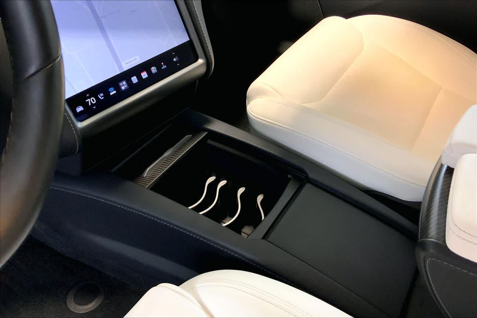 Used 2020 Solid Black Tesla Performance image 16