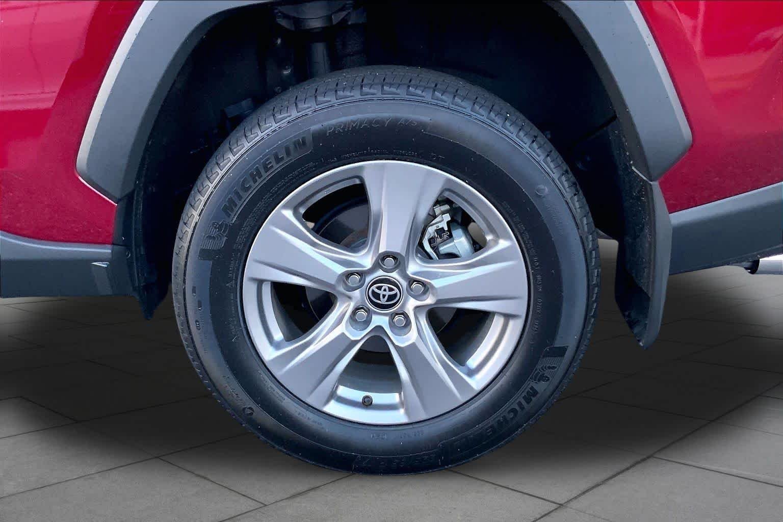 Certified Used 2025 Ruby Flare Pearl Toyota XLE image 11
