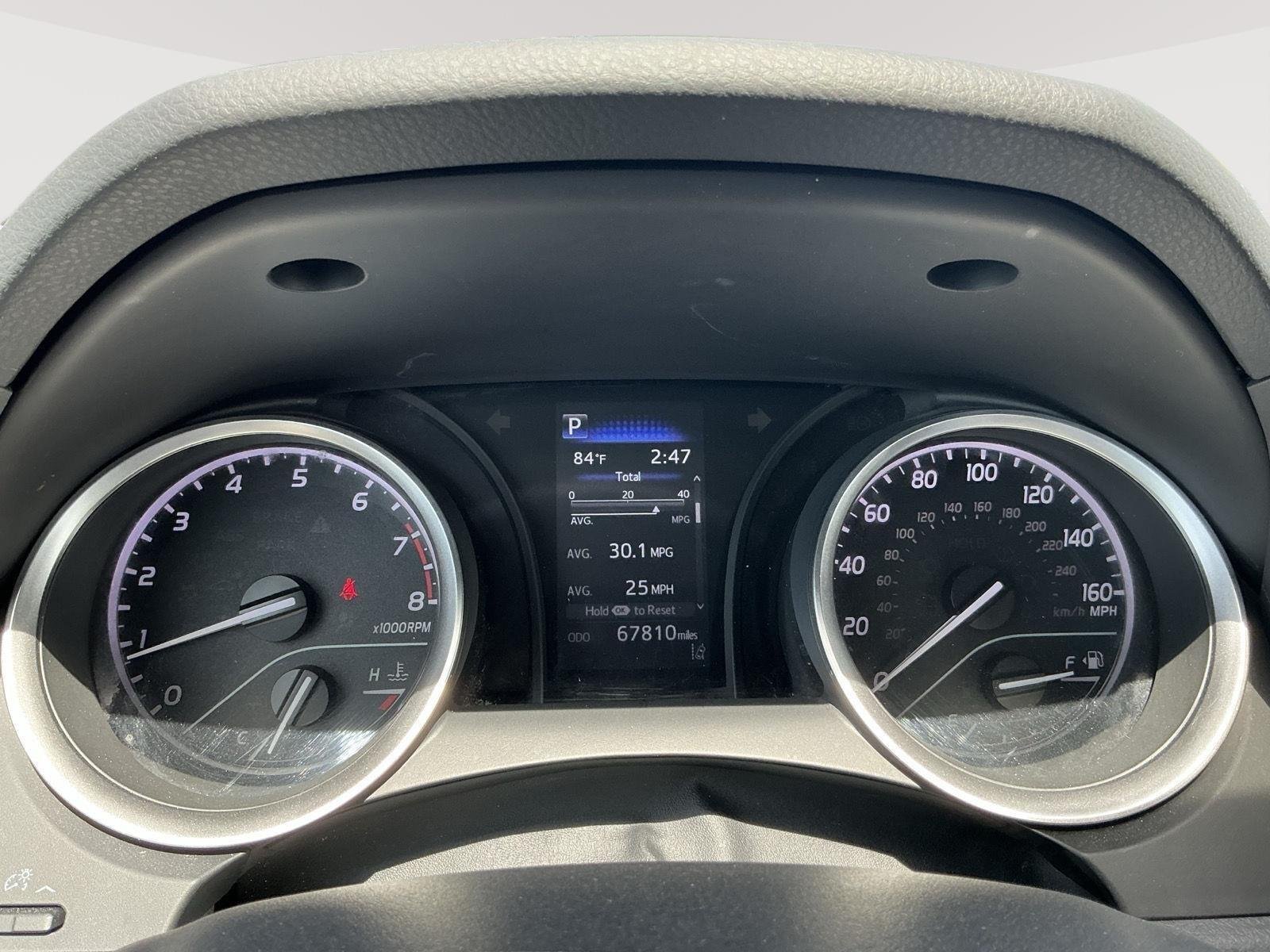 Certified Used 2021 Ruby Flare Pearl Toyota LE image 2