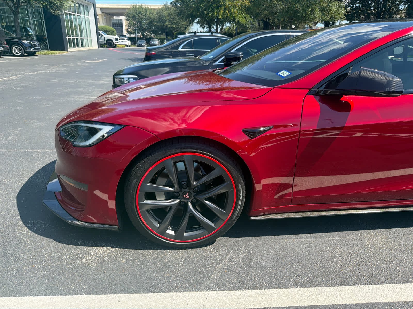 Used 2023 Red Multi-Coat Tesla  image 2