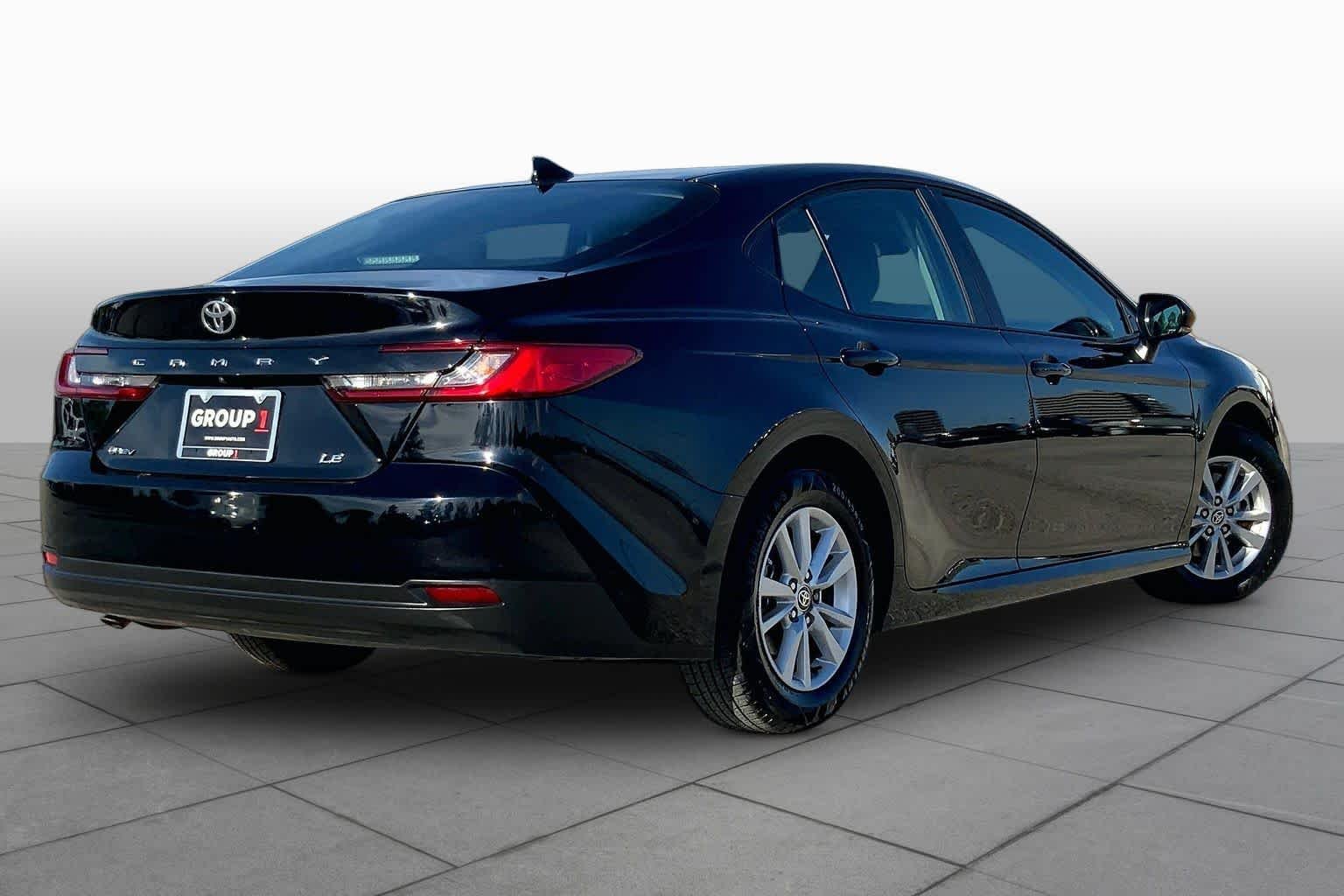 Used 2025 Midnight Black Metallic Toyota LE image 13