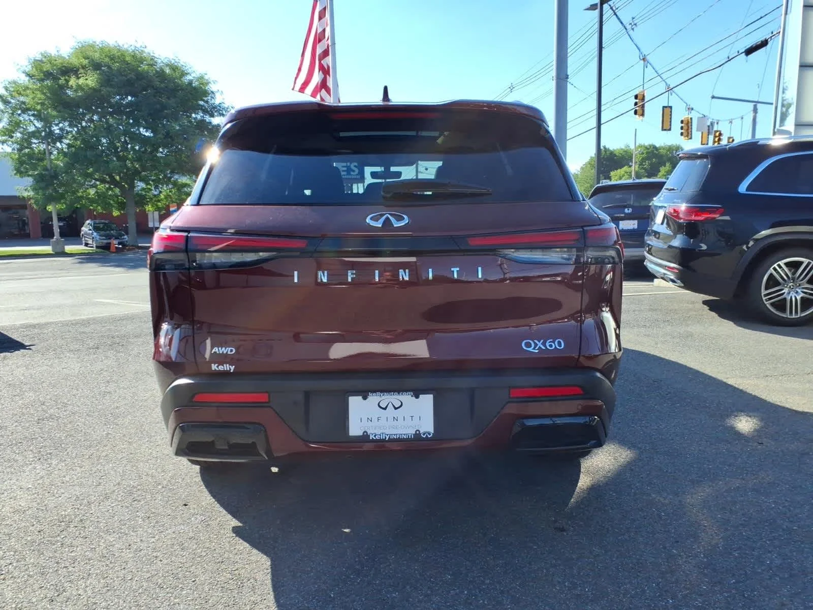 Certified Used 2023 Deep Bordeaux INFINITI LUXE image 5
