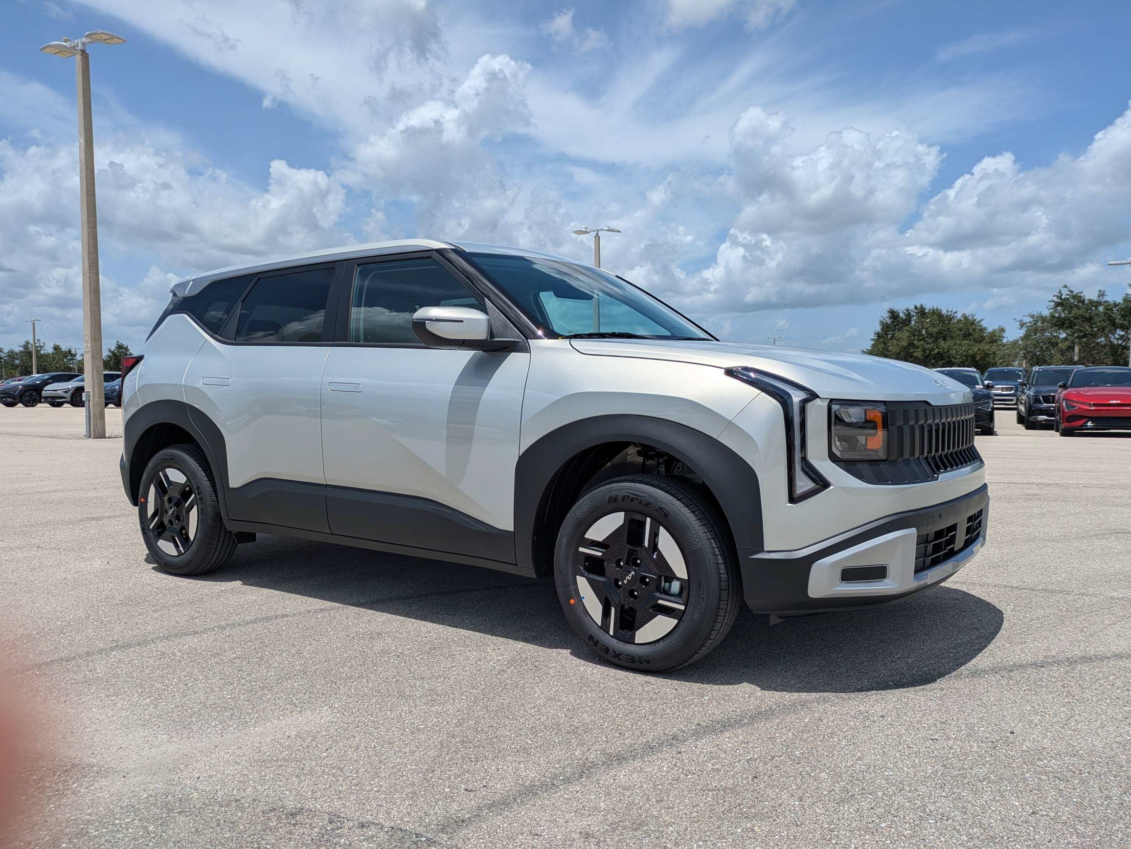 New 2027 Ivory Silver Kia LX image 2