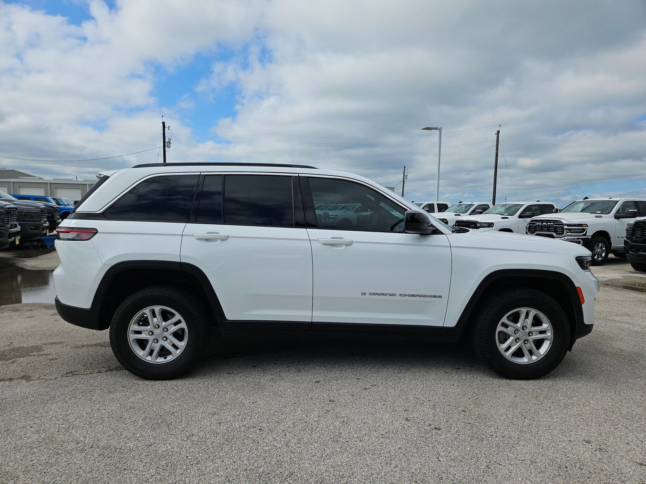 Used 2024 Bright White Clearcoat Jeep Laredo A image 2