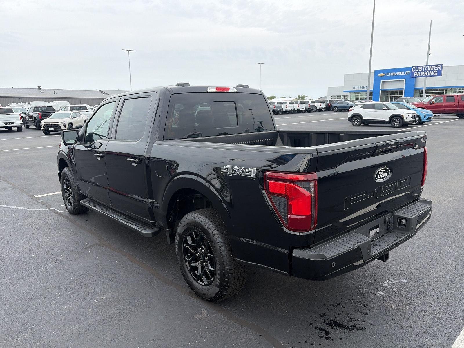 Used 2024 Agate Black Metallic Ford XLT image 6