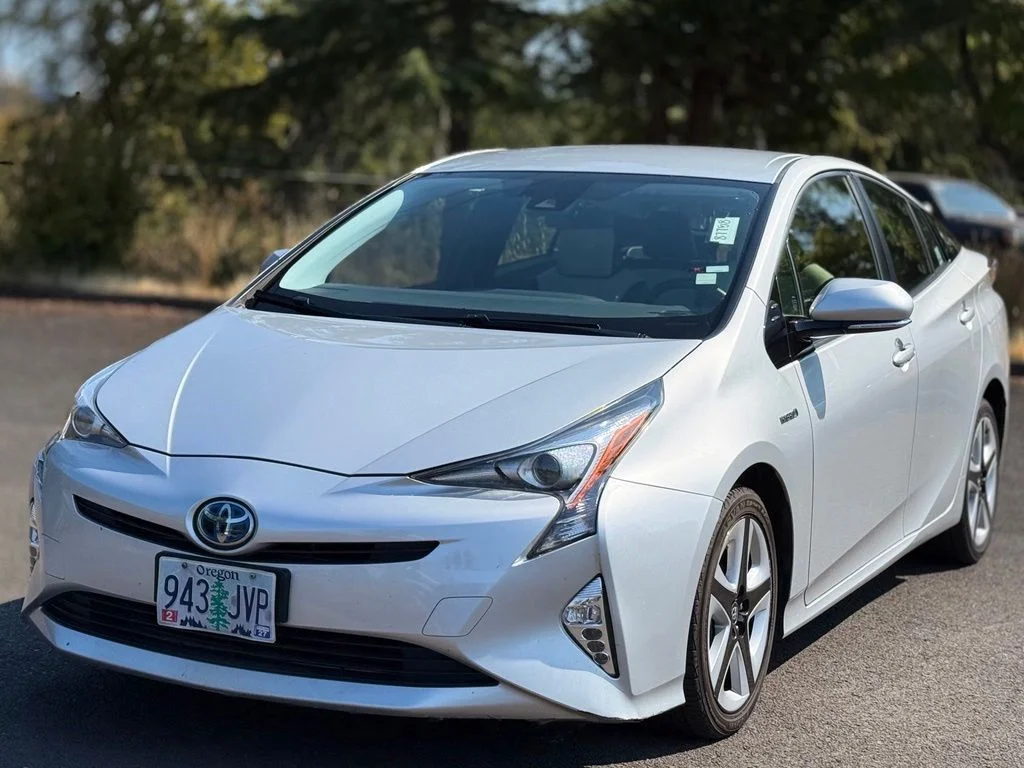 Used 2017 Silver Toyota Three Touring image 1