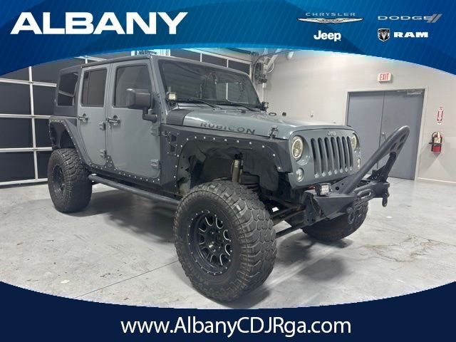 Used 2014 Gray Jeep Unlimited Rubicon image 1