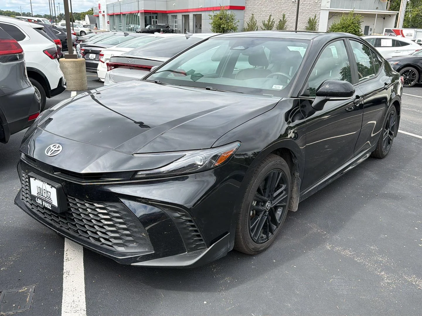 Used 2025 Midnight Black Metallic Toyota SE image 2