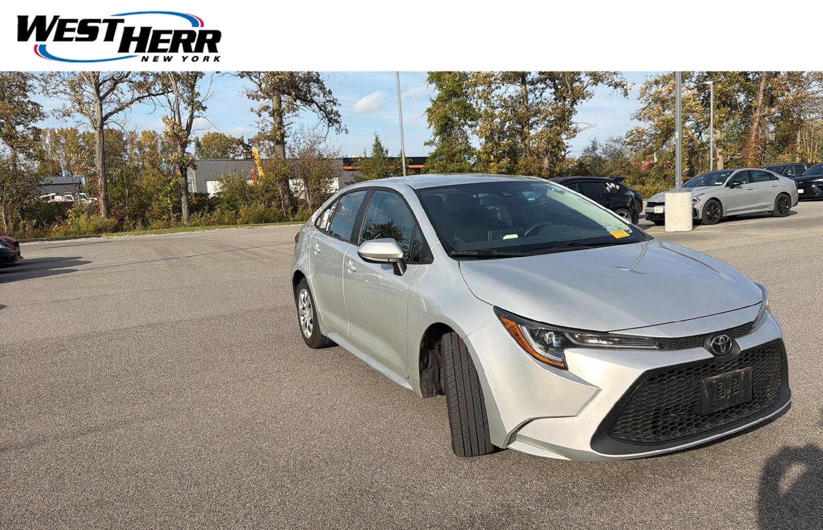 Used 2021 Classic Silver Metallic Toyota LE image 1