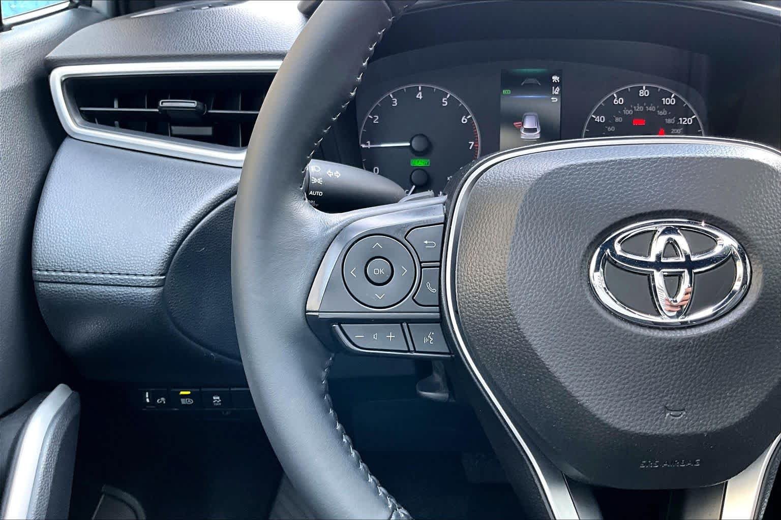 Used 2024 Sonic Silver/Jet Black Toyota Hybrid SE image 24