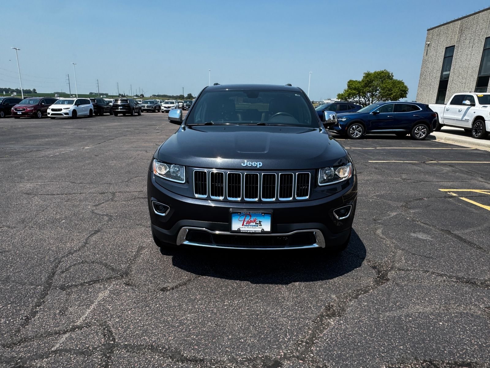 Used 2016 Steel Metallic JEEP Limited image 4
