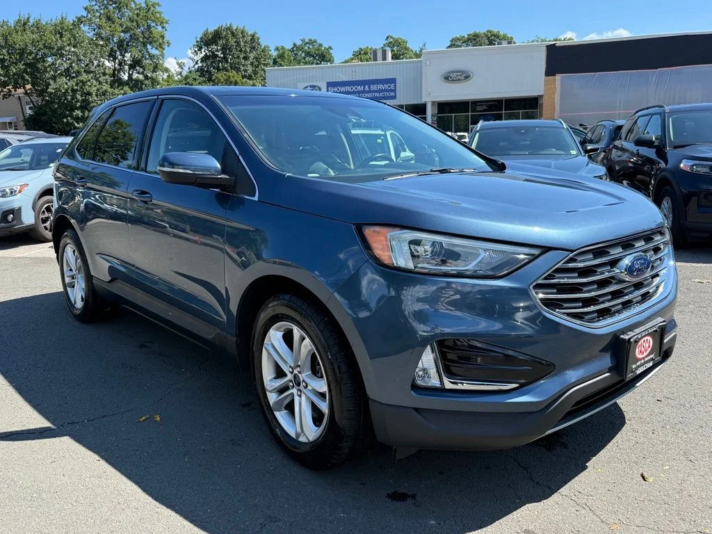 Used 2019 Blue Metallic Ford SEL image 4