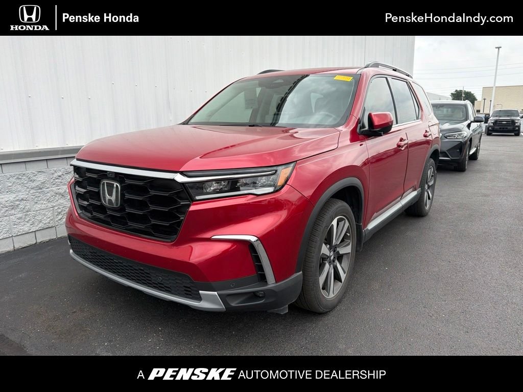 Certified Used 2023 Radiant Red Metallic II Honda Elite image 1