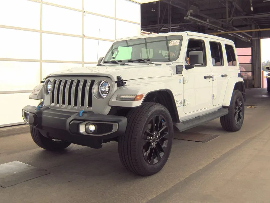 Used 2023 White Jeep Sahara 4xe image 1