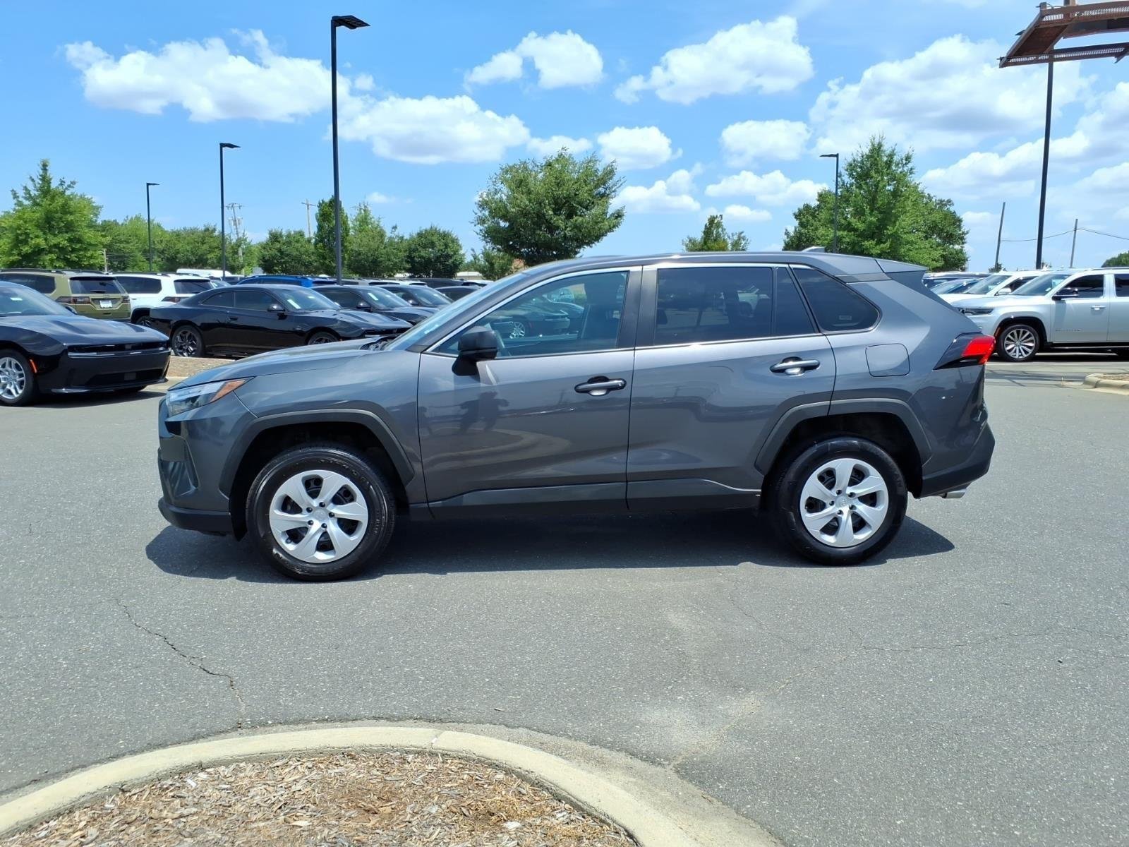 Used 2024 Magnetic Gray Metallic Toyota LE image 3