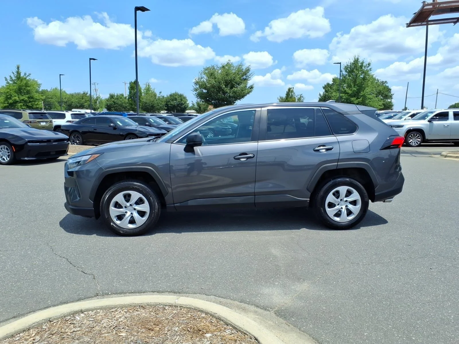 Used 2024 Magnetic Gray Metallic Toyota LE image 3