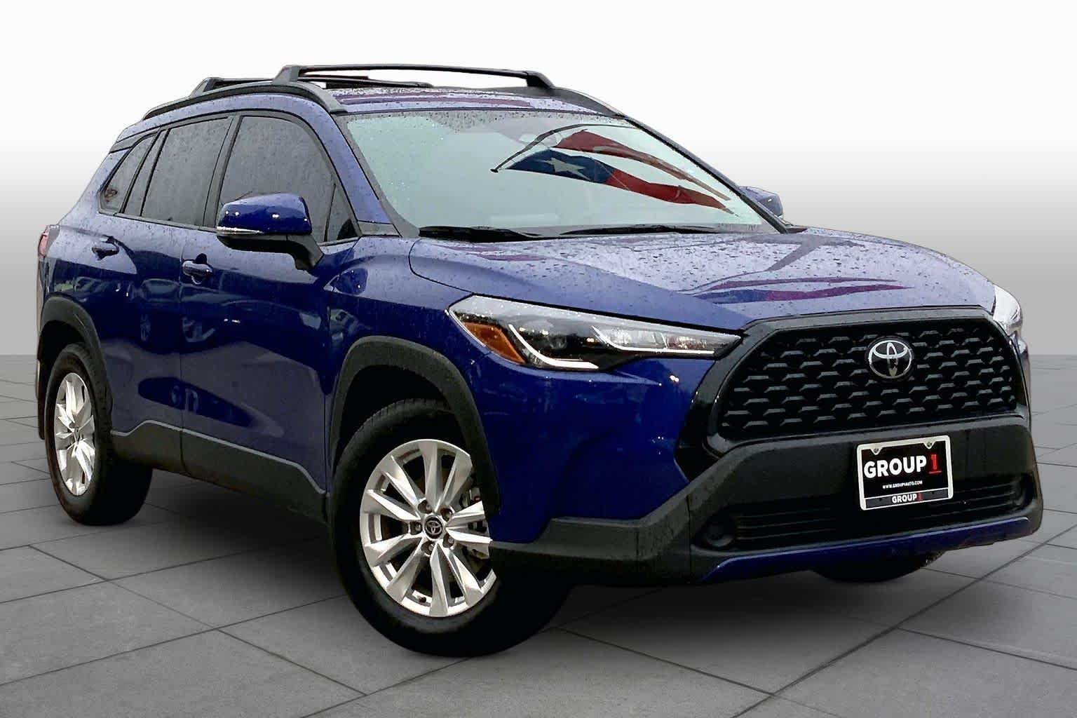 Used 2024 Blue Crush Metallic Toyota LE image 3