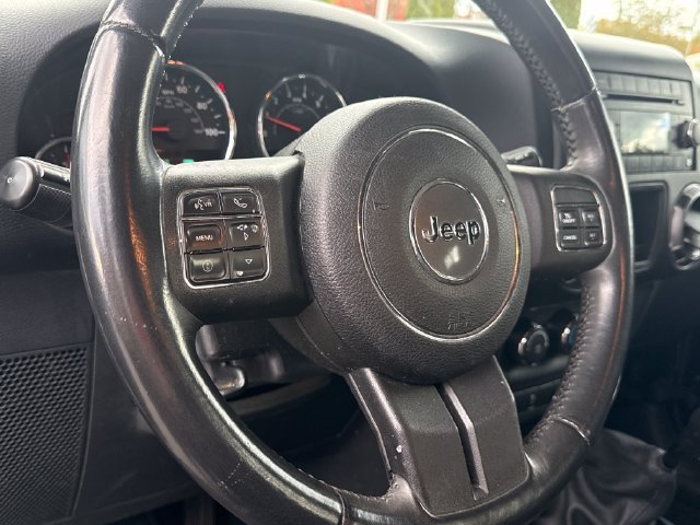 Used 2012 Black Clearcoat Jeep Unlimited Sport image 11